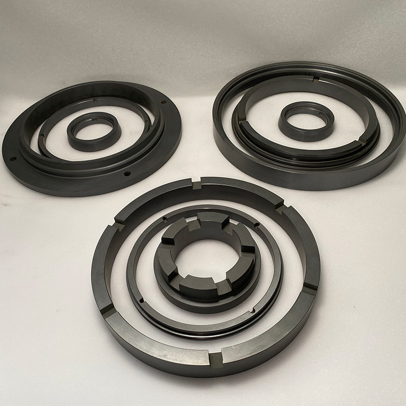 Pressure free/reactive silicon carbide stage ring